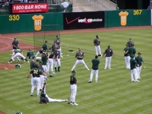 The Oakland A's - warming up before a game