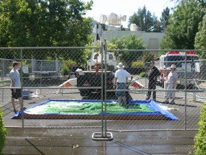 Sage, George and Doug preparig the green