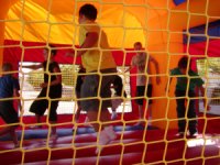 Kids enjoying the bounce house