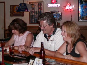 Mary, Doug and Pam - donating money to the machines