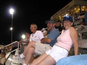 John, Rob and Mary taking in the action on the racetrack