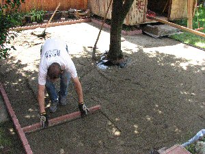 Bob leveling the sand