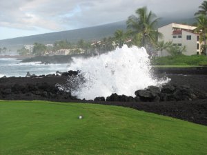 Wave crashing up thru a lava tube