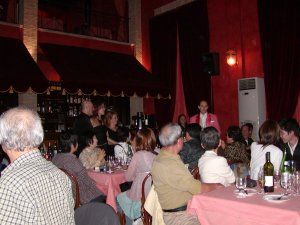 Emcee speaking Japanese to a tourist group