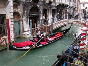 Gondolier hard at work, Venice
