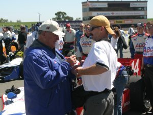 A.J. Foyt signing Bob's shirt